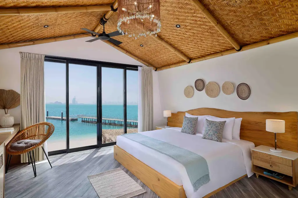 Beachfront resort bedroom with woven ceiling